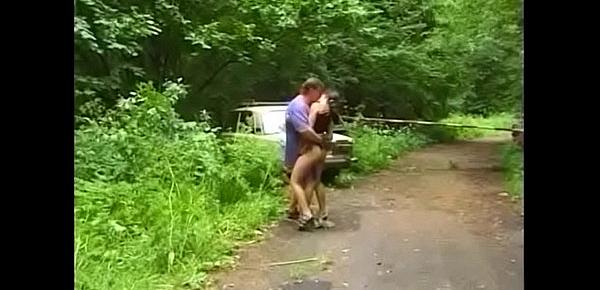  Russian couple is fucked by car in the woods